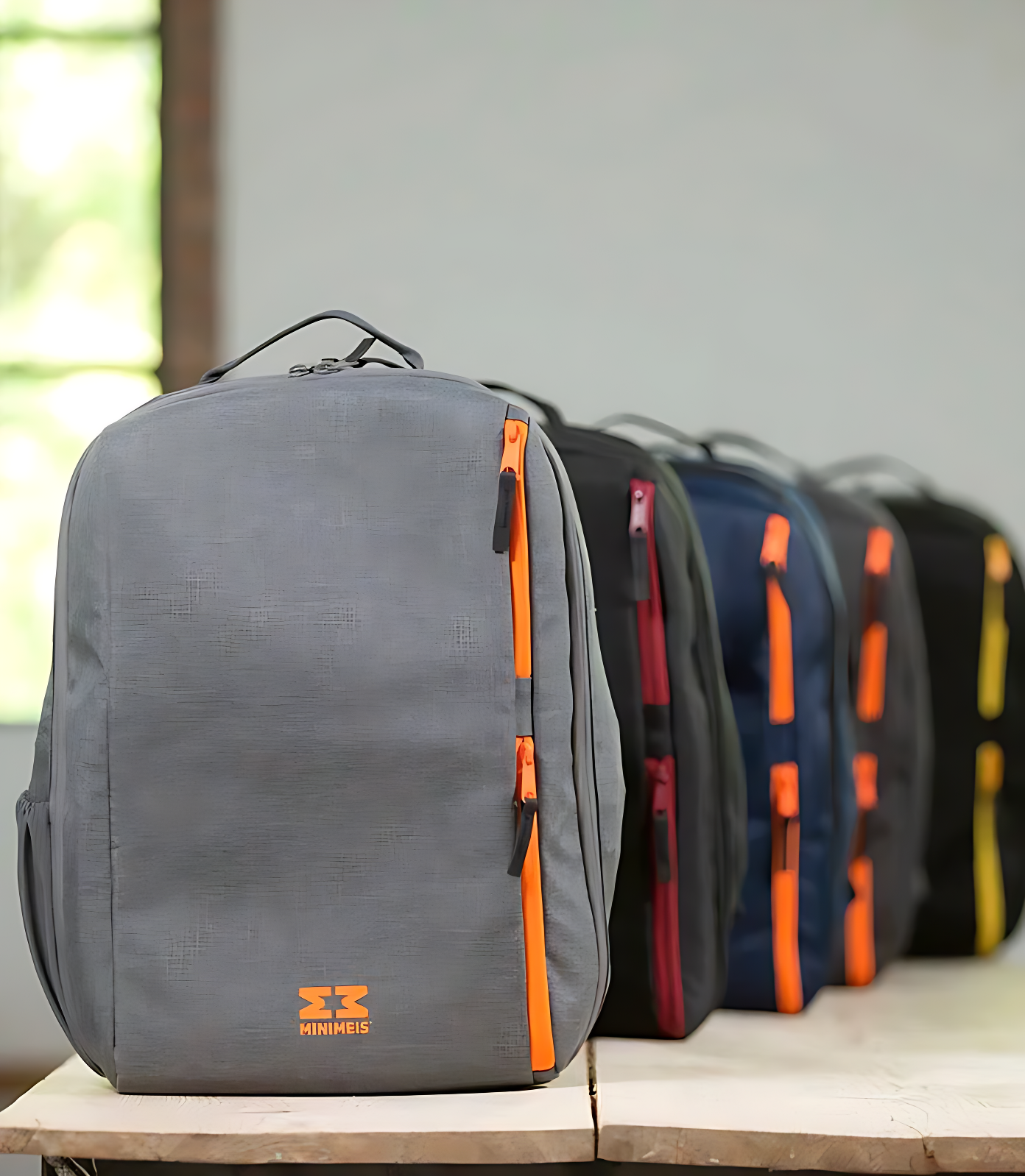 Row of MiniMeis backpacks